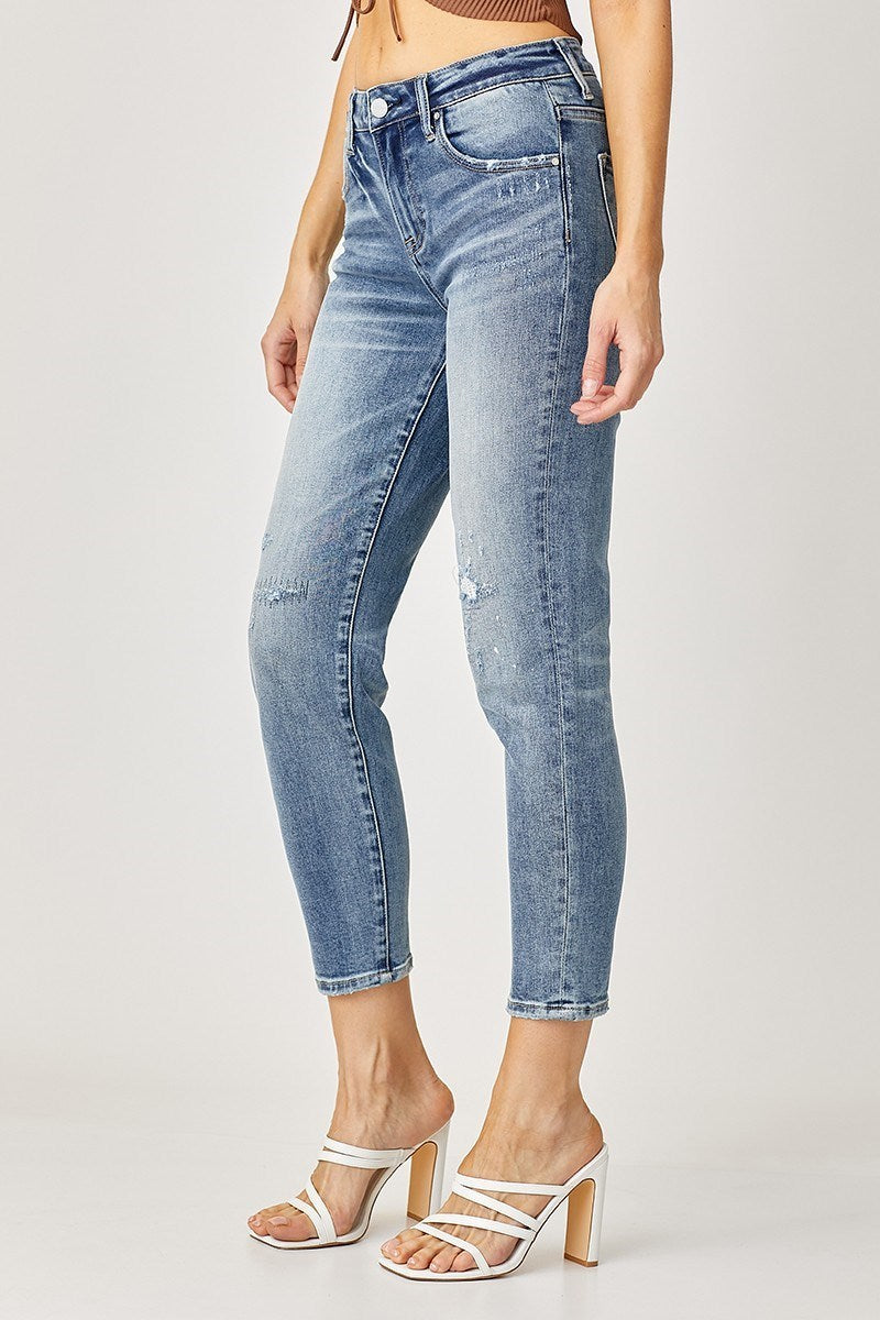 MID- RISE TAPERED JEANS